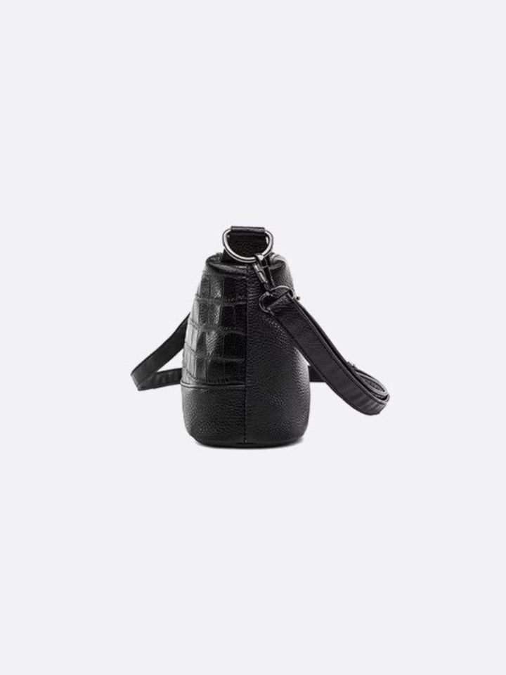 Sac bandoulière multipoches